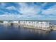 Luxury condos on the water with amazing views, featuring stunning white architecture at 4089 Yucatan Cir, Port Charlotte, FL 33948