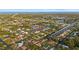 Breathtaking aerial view of a home with access to waterfront canals and nearby ocean at 4317 Mccullough St, Port Charlotte, FL 33948