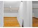 Attic with wood floors and exposed rafters provides a large storage area at 4317 Mccullough St, Port Charlotte, FL 33948