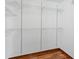 Walk-in closet with wood floor and wire shelves for optimal storage at 4317 Mccullough St, Port Charlotte, FL 33948