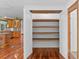 Walk-in pantry with shelving and wood floor at 4317 Mccullough St, Port Charlotte, FL 33948