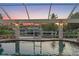 Gorgeous screened pool and waterfront view creating a serene and private outdoor oasis at 4317 Mccullough St, Port Charlotte, FL 33948