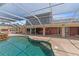 Backyard pool and outdoor bar offer many opportunities for outdoor activities at 4317 Mccullough St, Port Charlotte, FL 33948