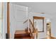Bright stairway with light walls and hardwood steps at 4317 Mccullough St, Port Charlotte, FL 33948