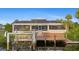 Home with backyard dock and canal access featuring a screened-in pool area at 4317 Mccullough St, Port Charlotte, FL 33948