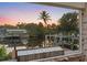 Water view with boat dock and lift seen through a screened enclosure at 4317 Mccullough St, Port Charlotte, FL 33948