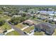 Aerial view displaying the home's setting, nearby waterfront, and the surrounding neighborhood at 4358 Pates St, Port Charlotte, FL 33948