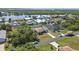 Wide aerial view highlighting the home's location near waterways and lush greenery at 4358 Pates St, Port Charlotte, FL 33948