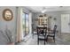 Dining area with a round table and a view of the backyard at 4358 Pates St, Port Charlotte, FL 33948