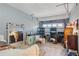 Bright garage featuring a large mirror, overhead door, and ample storage space at 4358 Pates St, Port Charlotte, FL 33948