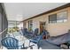 Covered patio with outdoor furniture, screened-in for comfort and relaxation at 4358 Pates St, Port Charlotte, FL 33948