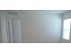 Neutral bedroom with a window allowing for natural light at 4830 Cazes Ave, North Port, FL 34287