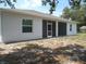 Back of the house showing the screened-in patio at 4830 Cazes Ave, North Port, FL 34287