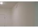 Neutral wall with a white door and ceiling light at 4830 Cazes Ave, North Port, FL 34287
