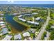 Aerial view of waterfront condos, waterway and Gulf access at 601 Shreve St # 53C, Punta Gorda, FL 33950