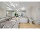 Bathroom features a large mirror, double vanity, and white cabinetry at 601 Shreve St # 53C, Punta Gorda, FL 33950