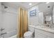 Bathroom features a shower over tub and a single vanity at 601 Shreve St # 53C, Punta Gorda, FL 33950