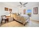 Cozy bedroom with light tan flooring, queen-sized bed, and natural light at 601 Shreve St # 53C, Punta Gorda, FL 33950