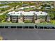 Exterior view of the waterfront condo with covered parking and lush landscaping at 601 Shreve St # 53C, Punta Gorda, FL 33950