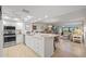 Bright kitchen features granite countertops, stainless steel appliances and tile flooring at 601 Shreve St # 53C, Punta Gorda, FL 33950