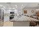 Kitchen with granite countertops, stainless steel appliances, and bar seating at 601 Shreve St # 53C, Punta Gorda, FL 33950