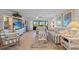 Inviting living room offers plenty of seating and a view of the screened lanai at 601 Shreve St # 53C, Punta Gorda, FL 33950