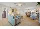 Bright and airy living room with access to dining and kitchen areas at 601 Shreve St # 53C, Punta Gorda, FL 33950
