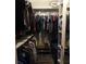 Walk-in closet with shelving and hanging racks, offering ample storage space for clothing and accessories at 6421 Grove Blvd, Punta Gorda, FL 33982