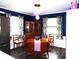 Cozy dining room featuring natural light, a vintage cabinet and table with decorative centerpieces at 6421 Grove Blvd, Punta Gorda, FL 33982