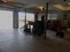 Garage featuring open doors for car parking and storage space at 6421 Grove Blvd, Punta Gorda, FL 33982