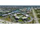 Scenic aerial view showcasing the condo community, adjacent waterway, and well-maintained landscaping at 1080 Bal Harbor Blvd # 12C, Punta Gorda, FL 33950
