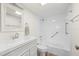Bathroom featuring a vanity, toilet, bath tub, and shower at 1080 Bal Harbor Blvd # 12C, Punta Gorda, FL 33950