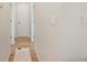 Hallway in neutral paint with light wood-style laminate flooring at 1080 Bal Harbor Blvd # 12C, Punta Gorda, FL 33950