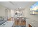 Open-concept living space seamlessly connects the living room, dining area, and kitchen at 1080 Bal Harbor Blvd # 12C, Punta Gorda, FL 33950