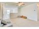 Upstairs bonus room that includes carpet and is full of natural light at 111 Rain Lily Ave, Spring Hill, FL 34609