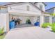 Spacious garage with ample storage space and a clean, organized layout at 111 Rain Lily Ave, Spring Hill, FL 34609