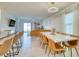 Open floor plan with kitchen, dining, and living spaces, perfect for entertaining at 111 Rain Lily Ave, Spring Hill, FL 34609