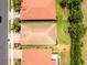 Stunning aerial view shows well-kept landscaping and lush green lawns surrounding single-Gathering homes in the neighborhood at 11666 Parrotfish St, Venice, FL 34292