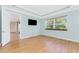 Bedroom featuring a large window, with an adjacent entryway at 11666 Parrotfish St, Venice, FL 34292