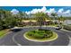 Inviting clubhouse with manicured landscaping and convenient parking surrounded by lush greenery at 11666 Parrotfish St, Venice, FL 34292