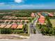 Nice street view of well-maintained single-Gathering homes with red tile roofs in an attractive residential neighborhood at 11666 Parrotfish St, Venice, FL 34292