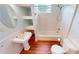 Bright bathroom featuring vanity and shower-tub combo at 1250 Lemon St, Punta Gorda, FL 33950