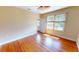 Sunny bedroom with wood floors and bright windows at 1250 Lemon St, Punta Gorda, FL 33950