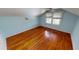 Bedroom with hardwood floors and natural light streaming through windows, a cozy retreat at 1250 Lemon St, Punta Gorda, FL 33950