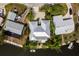 Aerial view of the property showing the layout, landscaping, and waterfront location with dock access at 155 Donna Ct, Punta Gorda, FL 33950