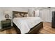 Comfortable bedroom features a wooden bed frame and a serene, relaxing atmosphere at 155 Donna Ct, Punta Gorda, FL 33950