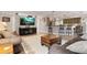 Open concept living area with stylish decor, comfortable seating, and a view into the kitchen at 155 Donna Ct, Punta Gorda, FL 33950