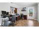 Bright office space featuring essential equipment, natural light, and tile flooring at 155 Donna Ct, Punta Gorda, FL 33950