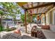 Outdoor patio with stylish seating, a covered pergola, and waterfront views at 155 Donna Ct, Punta Gorda, FL 33950