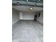 Spacious garage with concrete floor and a door at 16280 Minorca Dr, Punta Gorda, FL 33955